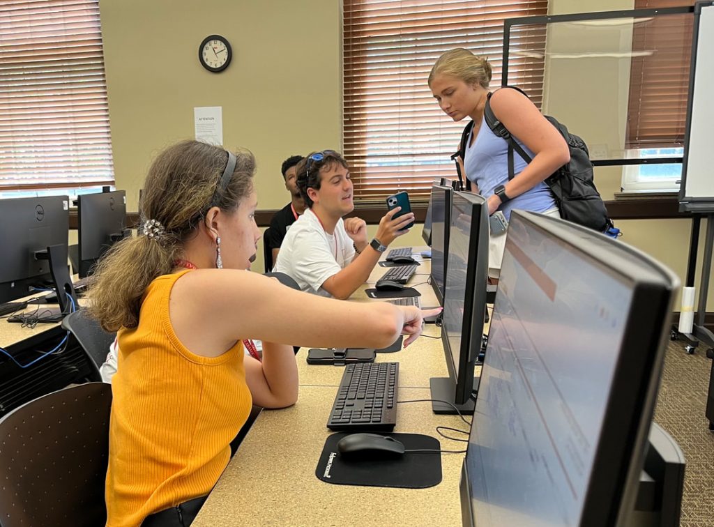 People working at a computer